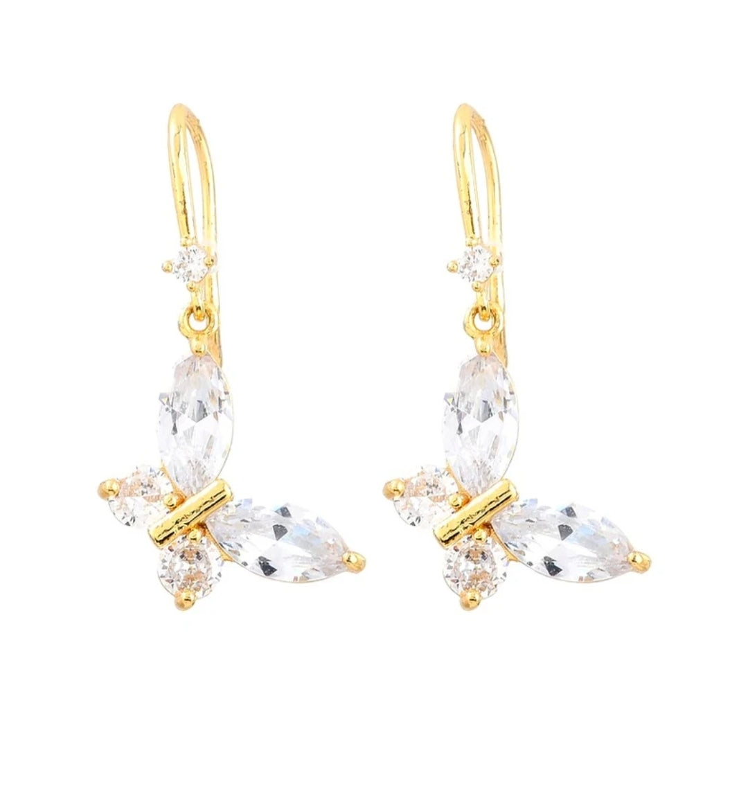 Boucles d'oreilles femme tombantes dorées à l'or fin papillon avec oxydes blanches