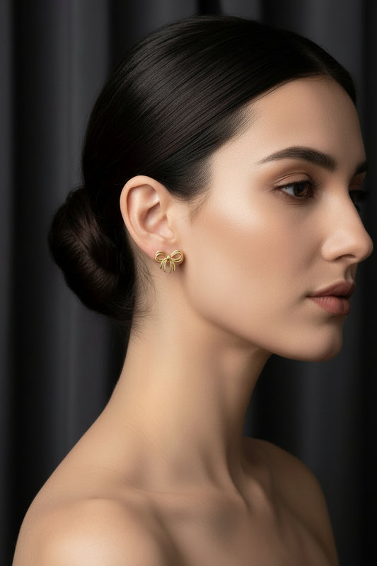 Boucles d'oreilles femme jolie nœud dorées à l'or fin