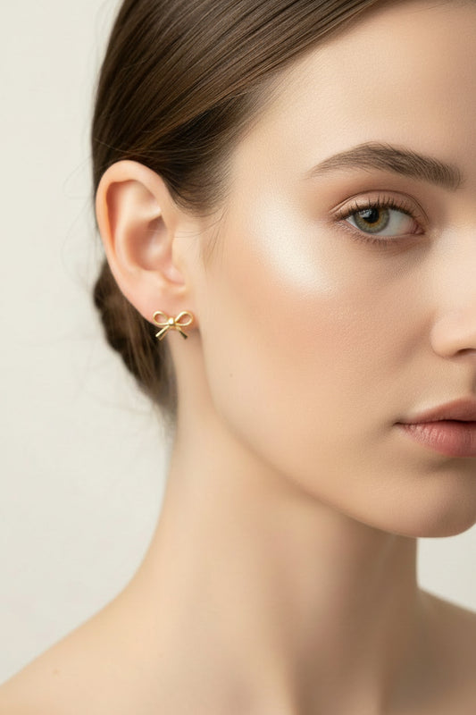 Boucles d'oreilles femme nœuds dorées à l'or fin 45 * 35 mm