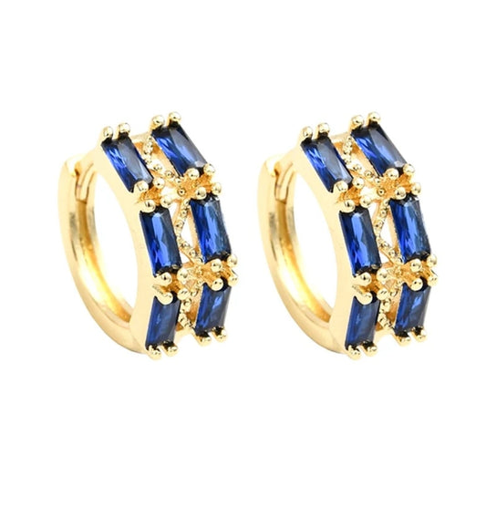 Boucles d'oreilles Créoles dorées à l'or fin oxydes bleues serties