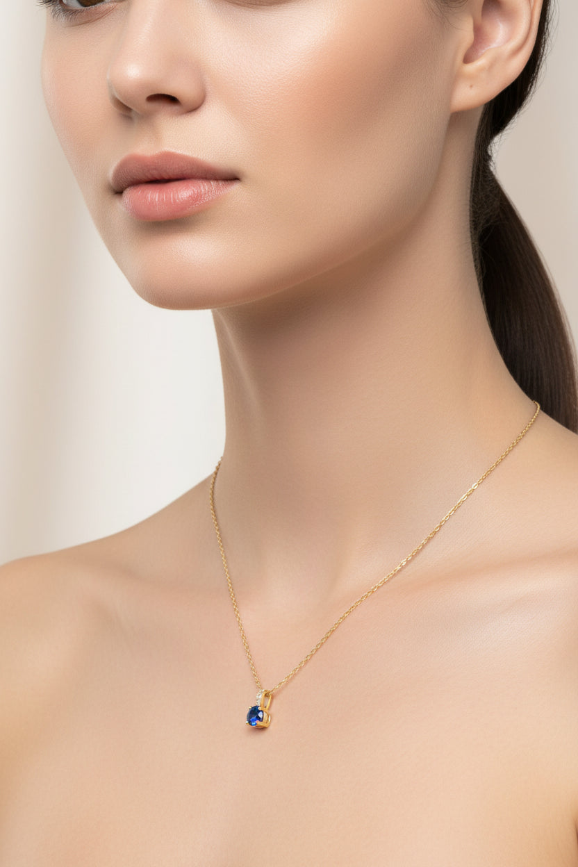 Collier femme oxyde bleu nuit et zirconiums sertis sur la bélière doré à l'or fin